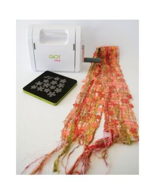 GO! Cherry Blossoms Scarf Pattern (PQ10240) - shown with GO! Cherry Blossoms Die (55385) and GO! Baby Fabric Cutter (55300) - both sold seperatly, used to create this scarf.