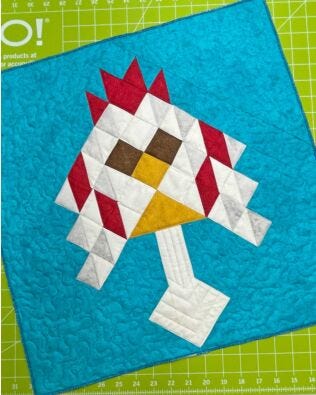 GO! Chuck and Henrietta Wall Hanging Pattern