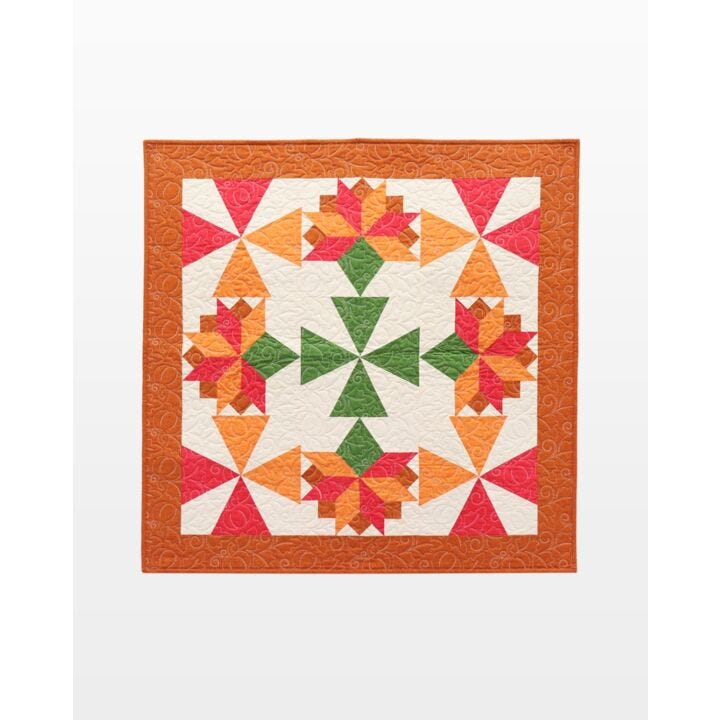 "Bountiful Harvest Throw Quilt” is a Free Thanksgiving Quilt Pattern designed by Bea Lee of Be a Quilter from Accuquilt!