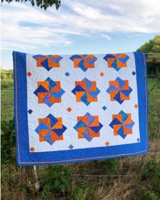 GO! Whirling Card Trick Throw Quilt Pattern