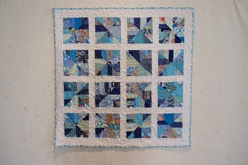 Blue Scrappy Triangle Quilt