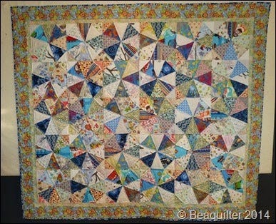 Scrappy Kaleidoscope Baby Quilt