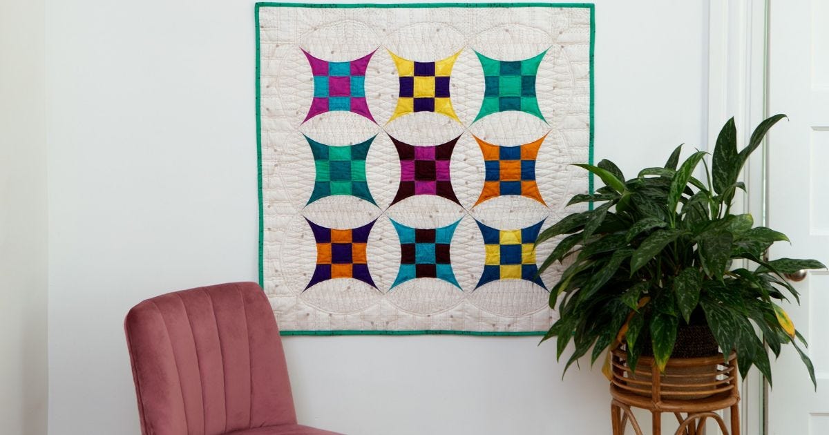 The Final 2023 AQS & AccuQuilt-Along Series Is the GO! Dart Around Glorified Nine Patch Throw Quilt