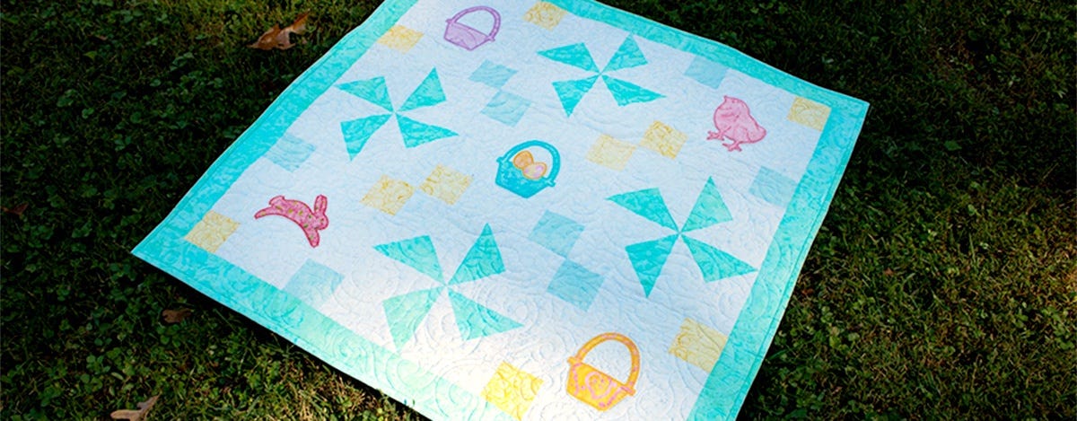 See How Embroidery Makes This Spring Medley Baby Quilt So Adorable