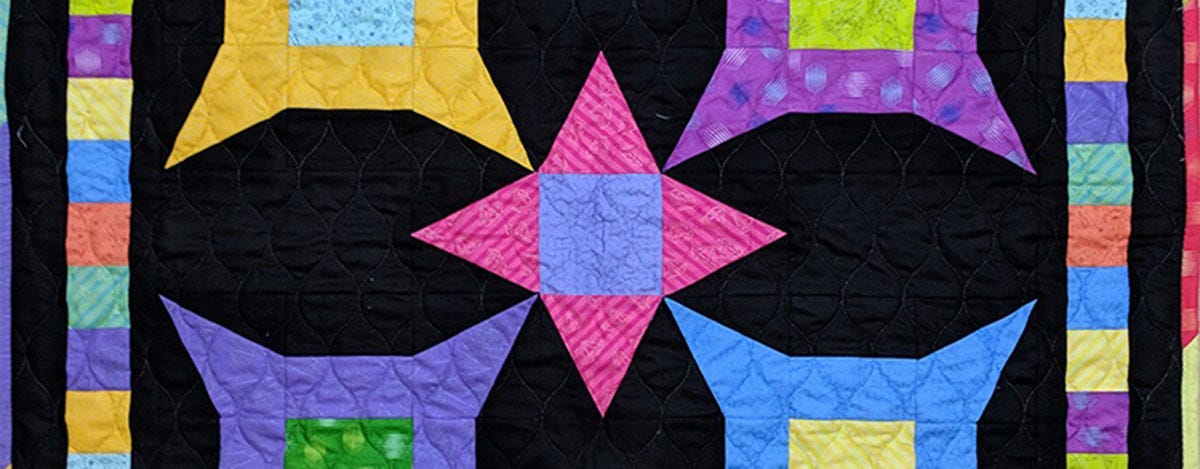 Color Blast Quilt with Angles from Heidi Pridemore