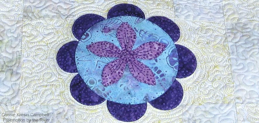 Free motion quilt the table runner