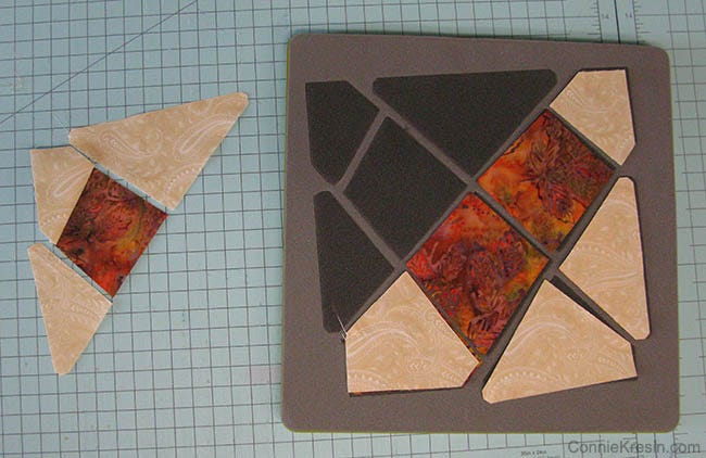 Start with the top left corner and sew the sections together. &nbsp;You will join the center two first.