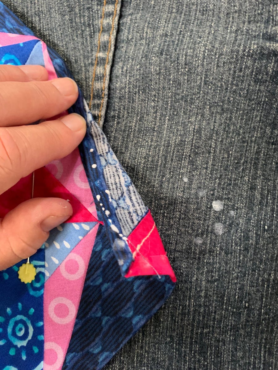 Basting the Lucky Star Block onto the Jean Jacket with Glue