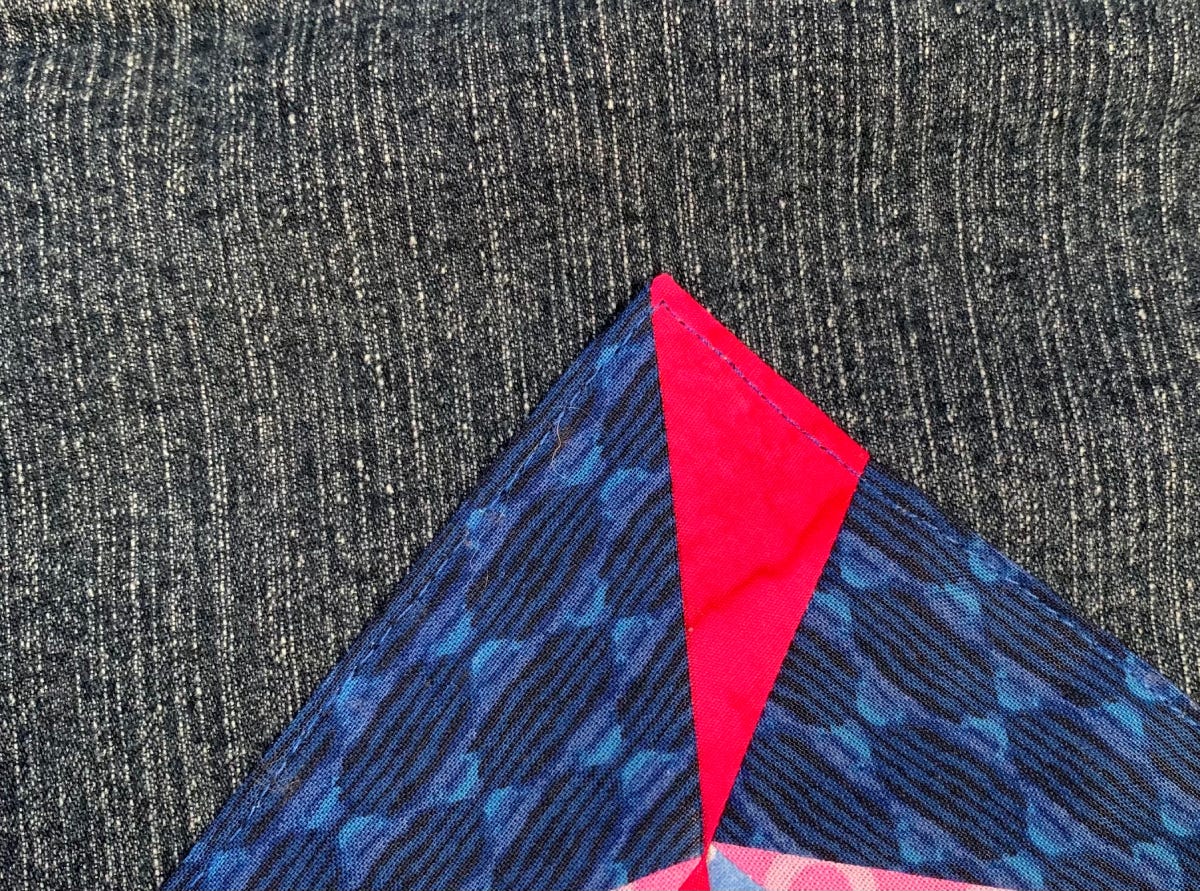 Close Up of the Top Stitch on the Jean Jacket