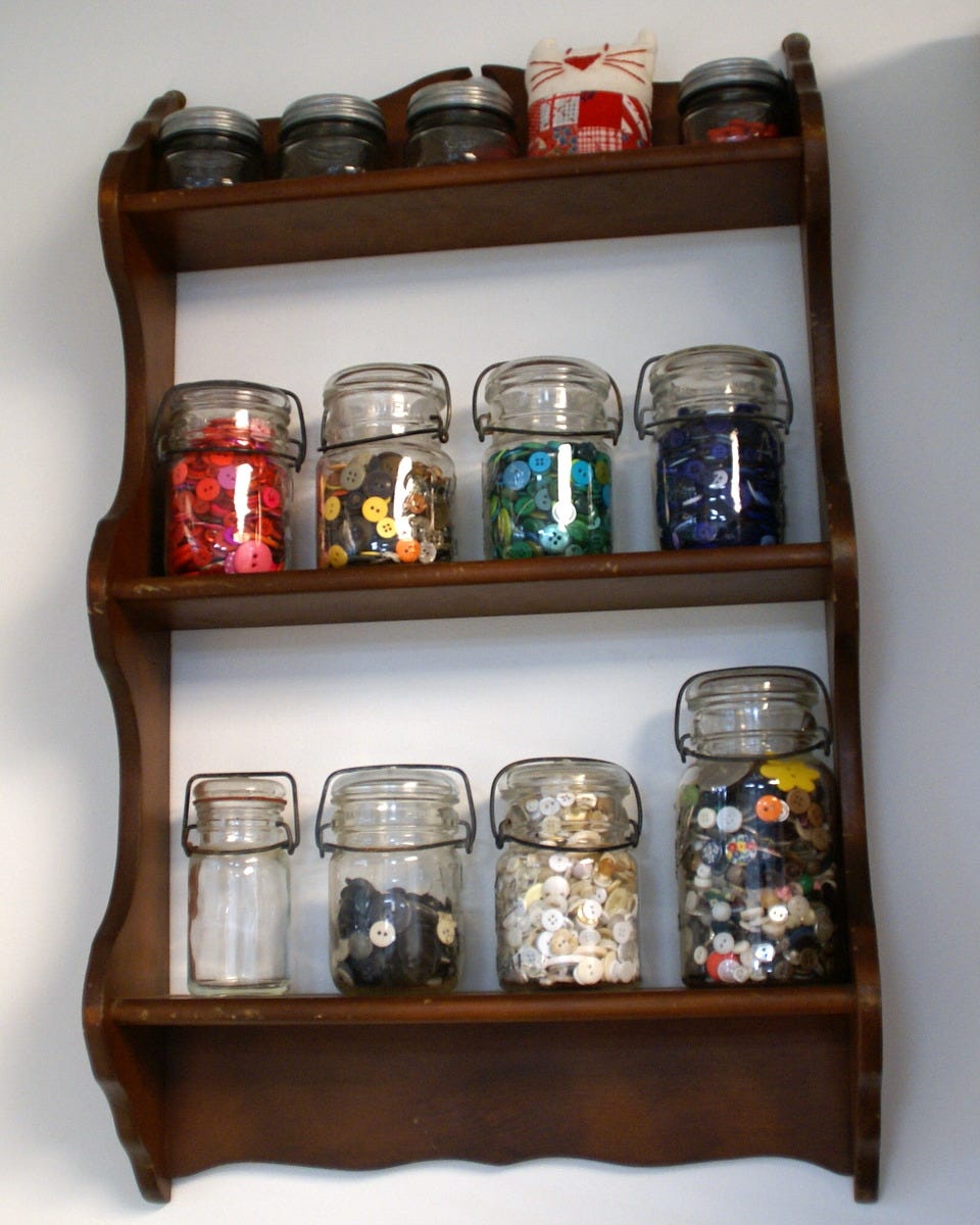 buttons organized in vintage canning jars