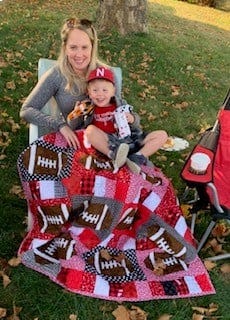 Erica's Daughter and Grandson with His Football Quilt