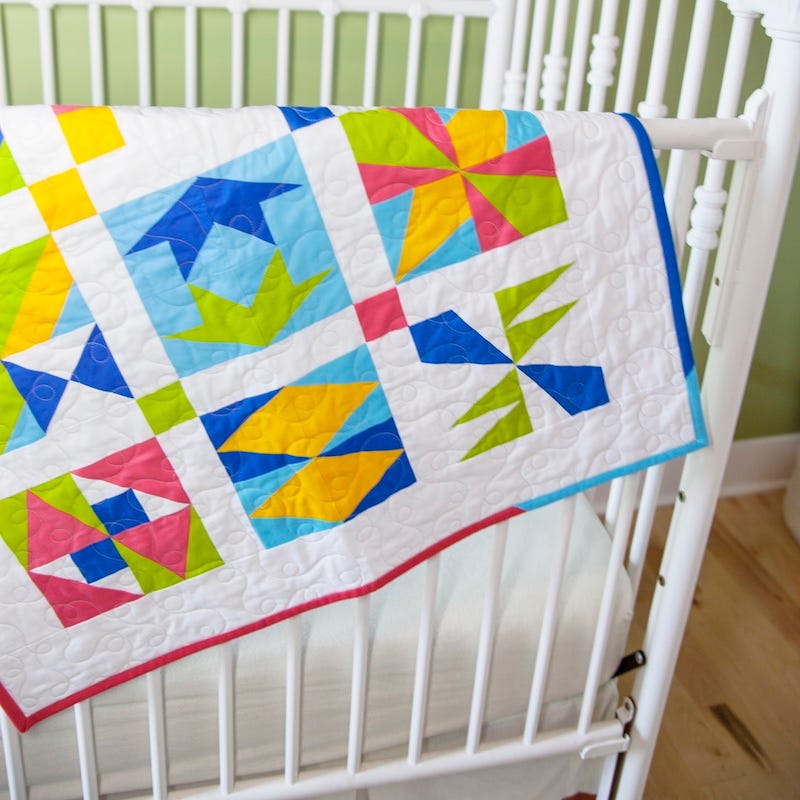 Quilting on a Budget - scrappy binding crib