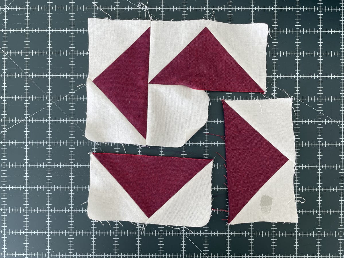 Two Flying Geese Units Sewn to the Center Square