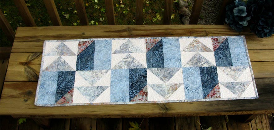 Winter Blues table runner made with AccuQuilt Go dies